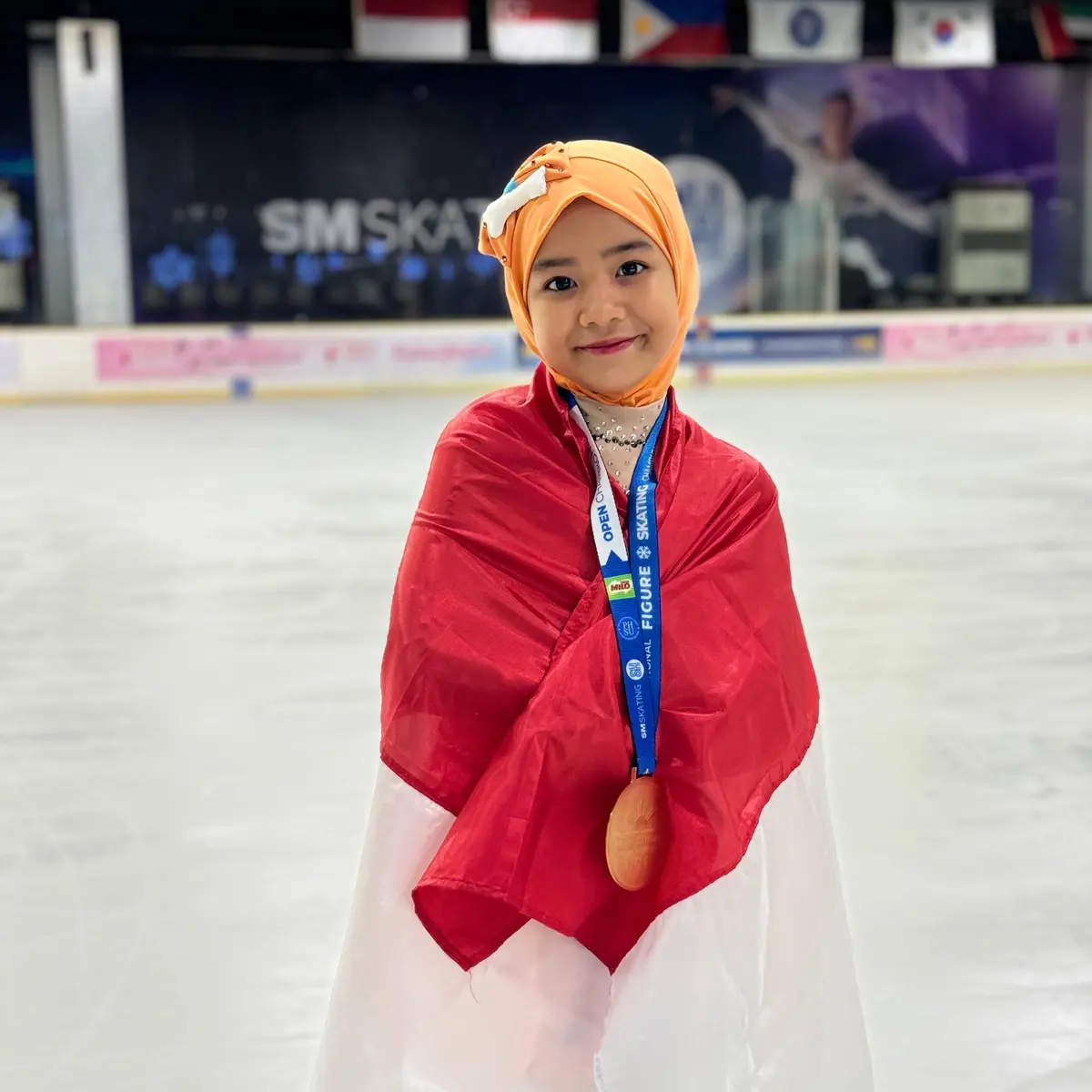 medina-khaira-fastabiqa-atlit-termuda-dan-berhijab-raih-emas-di-kompetisi-ice-skating-internasional